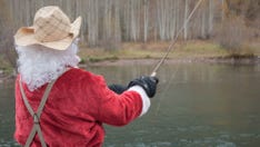 300 Santas go fishing on North Carolina lake, benefiting Toys for Tots and setting world record