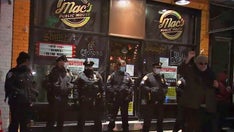 Supporters protest outside Mac's tavern on Staten Island in defiance of New York's COVID restrictions