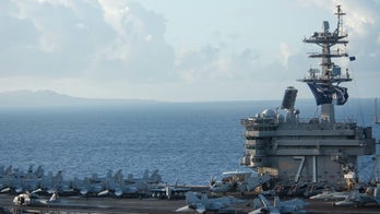Aircraft carrier Theodore Roosevelt conducts 'man overboard' search for missing sailor