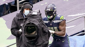 Seahawks' DK Metcalf celebrates TD with some light camera work, gets birthday card from teammates