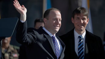 Colorado governor's husband taken to the hospital over worsening COVID-19 symptoms