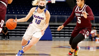 Basketball in a mask? Rare but not unheard of in pandemic