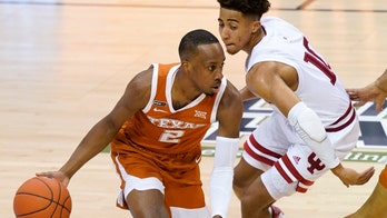 Coleman, No. 17 Texas beat Indiana 66-44 to reach Maui final