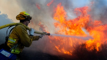 Southern California's Bond Fire explodes overnight, forcing evacuation of thousands