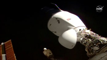 SpaceX Dragon 2 cargo ship docks on International Space Station
