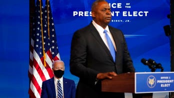 Biden defends nomination of retired general to lead Defense Department