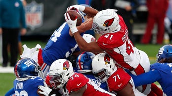 Murray throws TD, Cards end 3-game skid, beat red-hot Giants