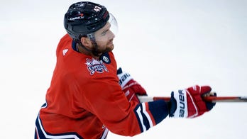 NHL teams begin to unveil advertisements on helmets