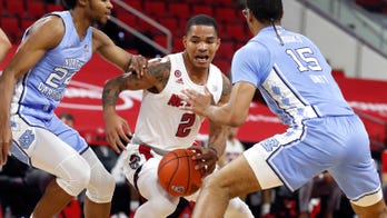 Daniels, N.C. State beat 17th-ranked North Carolina 79-76