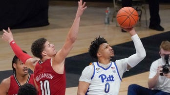 Louisville defeats short-handed Pitt 64-54