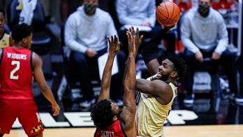 Newman scores 17, Purdue holds off Maryland 73-70