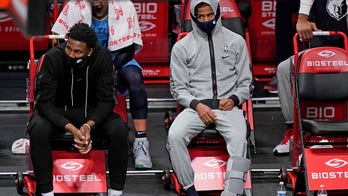 Rookie of the Year Ja Morant wheeled off with ankle injury