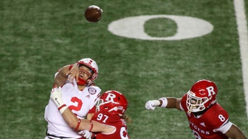 Martinez, Nebraska overcome 4 turnovers, beat Rutgers 28-21