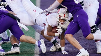 Jones has 2 TD runs, Stanford tops No. 23 Washington 31-26