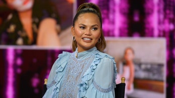 Chrissy Teigen slams critic who said she posts on social media too much: 'Weird and angry'