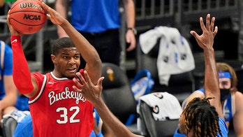 Liddell returns, No. 20 Ohio State tops UCLA 77-70