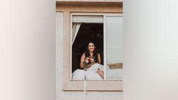 Bride with coronavirus marries groom through second-story window