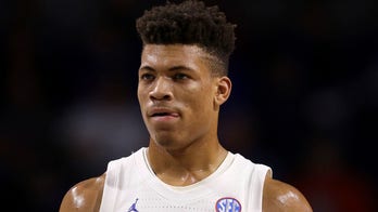 Florida's Johnson rejoins team, works as coach amid recovery