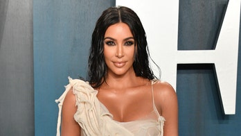 Kim Kardashian stuns in itsy-bitsy green bikini: 'Always find your light'
