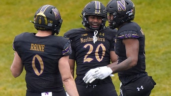 Porter leads way as No. 15 Northwestern runs over Illinois