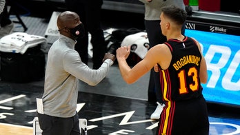 Young scores 37 as Hawks pound Bulls 124-104 in opener