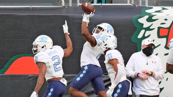 No. 20 UNC runs wild, rolls past No. 9 Miami 62-26