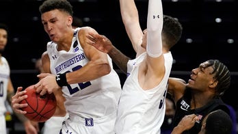 Buie, Northwestern beat No. 4 Michigan State 79-65