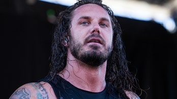 As I Lay Dying singer Tim Lambesis hospitalized after accidentally setting himself on fire