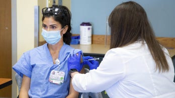 Who should COVID-19 vaccines go to next?