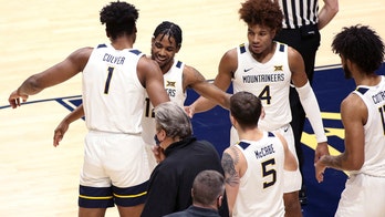 No. 11 West Virginia rallies, escapes North Texas 62-50