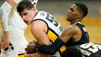 Garza scores 22 points, No. 4 Iowa beats Purdue 70-55