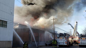Hundreds of Chicago firefighters battle 4-alarm blaze at West Side auto parts warehouse