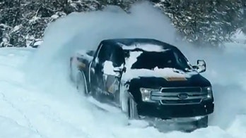 Electric Ford F-150 drifts through the snow in new video