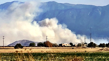 California wildfire explodes to nearly 2,000 acres as firefighters work to gain upper hand