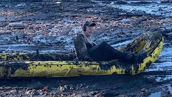 Massachusetts firefighters rescue man stuck chest-deep in mud of drained pond