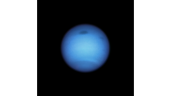 Neptune's mysterious dark spot has reversed course and experts are baffled