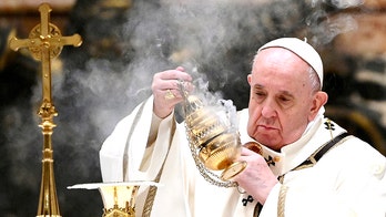 Pope Francis celebrates low-key Christmas Eve Mass amid coronavirus restrictions