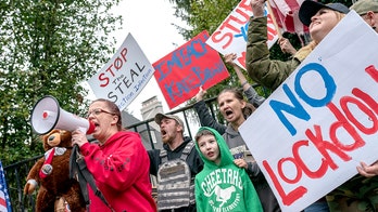 Michigan electors to receive armed guard for Monday vote