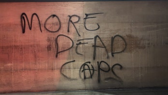 Seattle police arrest 4 after protesters damage businesses, residences after dark