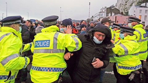 Amid fear over new coronavirus strain, France lets in some UK cargo, passengers