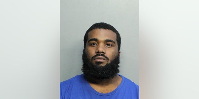 Corthoris Jenkins, 28, is charged with shooting a suspected burglar after allegedly chasing him down and firing multiple times.