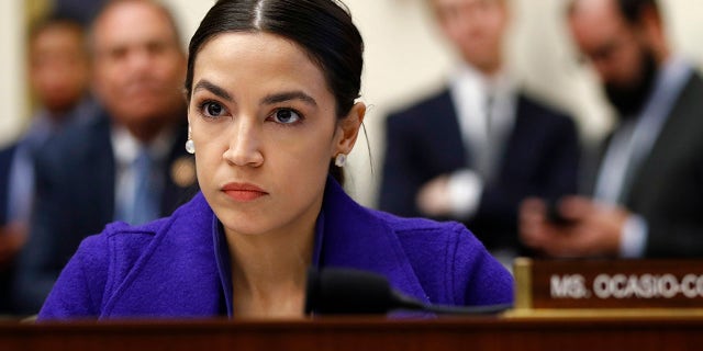 In this Wednesday, April 10, 2019, file photo, Rep. Alexandria Ocasio-Cortez, D-N.Y., listens during a House Financial Services Committee hearing with leaders of major banks on Capitol Hill in Washington. Ocasio-Cortez Thursday lost a vote in the House Democratic Steering and Policy Committee to be a member of the House Energy and Commerce Committee. (AP Photo/Patrick Semansky, File)
