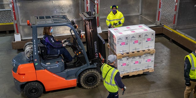 FedEx workers transport vaccine doses in Grand Rapids, Mich. (FedEx)
