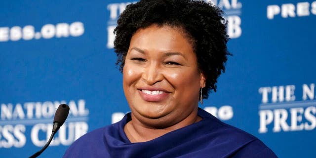 In this Nov. 15, 2019, file photo, former Georgia House Democratic Leader Stacey Abrams, speaks at the National Press Club in Washington. Abrams is widely credited with being behind Georgia's recent shift from a reliably red state to a major battleground. Former Sen. Kelly Loeffler, R-Ga., is starting a voter organization called Greater Georgia aimed at rivaling Abrams' political machine called Fair Fight. (AP Photo/Michael A. McCoy, File)