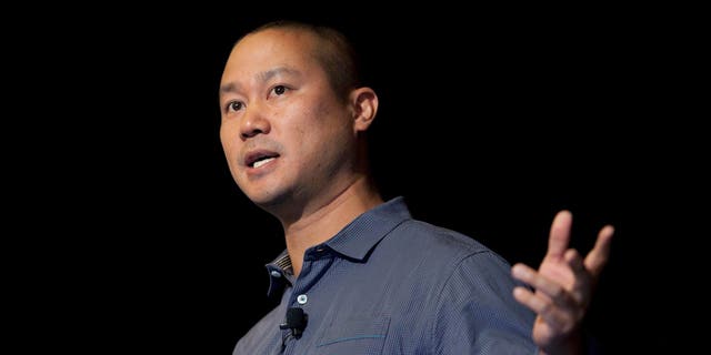 In this September 30, 2013 file photo, Tony Hsieh speaks at a luncheon at the Grand Rapids Economic Club in Grand Rapids, Mich. (Cory Morse / The Grand Rapids Press via AP)