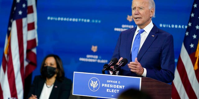 President-elect Joe Biden speaks as Vice President-elect Kamala Harris listens at left, during an event to introduce their nominees and nominees to economic policy positions at the Queen Theater, Tuesday, December 1, 2020, in Wilmington , Of the.  (AP Photo / Andrew Harnik)