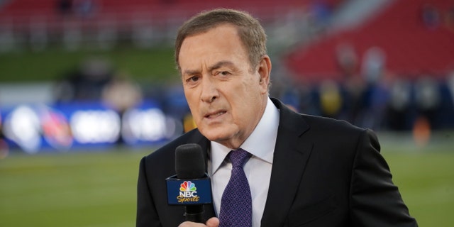Al Michaels works on the sideline before an NFL game between the Los Angeles Rams and the Seattle Seahawks, Sunday, Dec. 8, 2019, in Los Angeles.