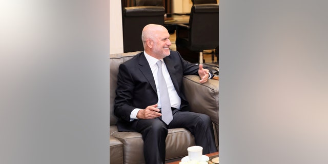 In this Aug. 8, 2019 file photo, then-Lebanese Public Works and Transportation Minister Youssef Fenianos speaks during a meeting with Prime Minister Saad Hariri at the government House in Beirut, Lebanon. (Dalati Nohra/Lebanese Government via AP, File)
