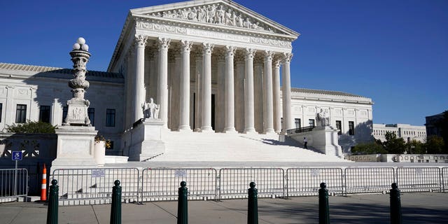 In this Nov. 4, 2020 photo, the Supreme Court in Washington. The Supreme Court justices set a deadline of Jan. 22 for Pennsylvania Secretary of State Kathy Boockvar to respond to a petition from the Trump campaign. (AP Photo/J. Scott Applewhite)