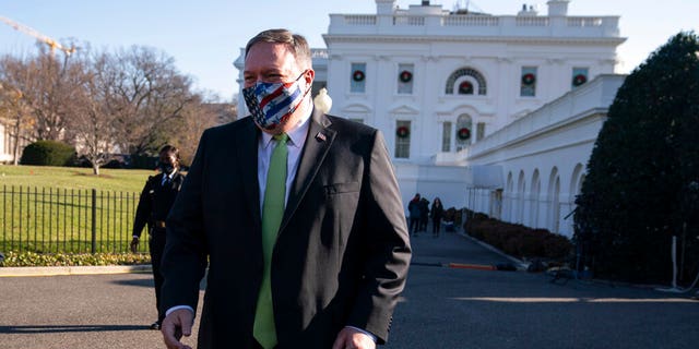 Secretary of State Mike Pompeo visits the White House with family members, Friday, Dec. 11, 2020, in Washington.